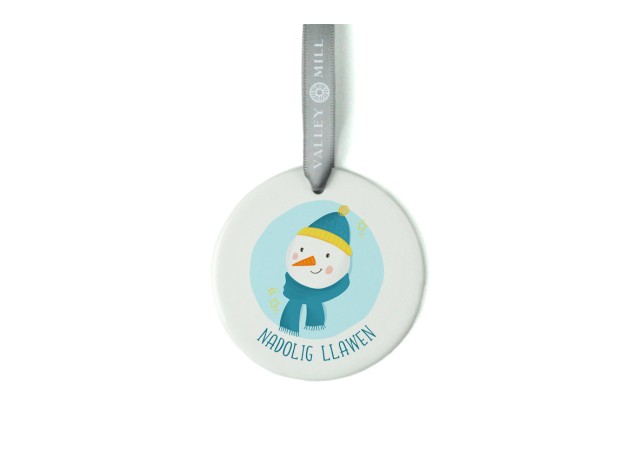 White ceramic christmas tree decoration with the image of a cute snowman